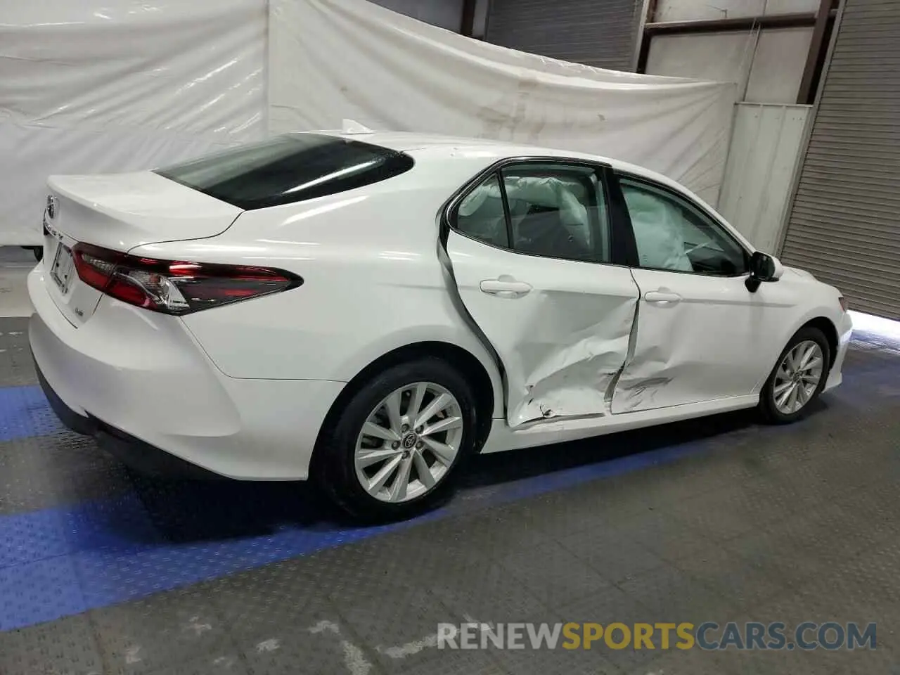 3 Photograph of a damaged car 4T1C11AK1PU802894 TOYOTA CAMRY 2023