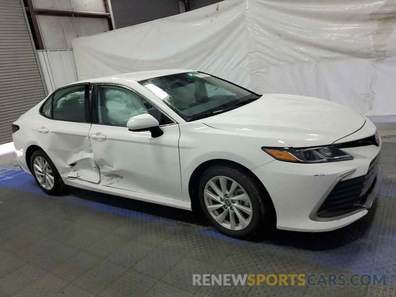 4 Photograph of a damaged car 4T1C11AK1PU802894 TOYOTA CAMRY 2023