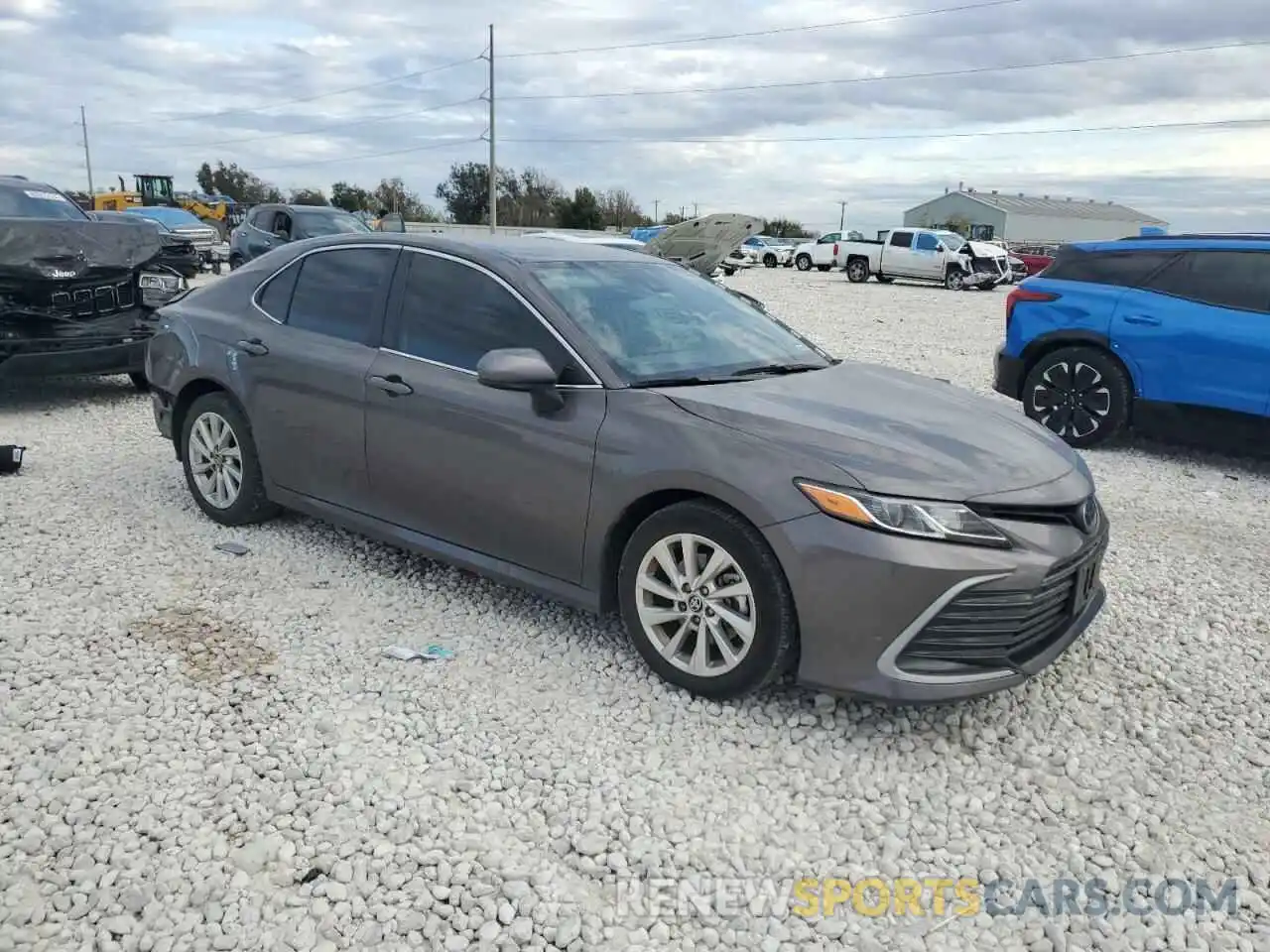 4 Photograph of a damaged car 4T1C11AK1PU808503 TOYOTA CAMRY 2023