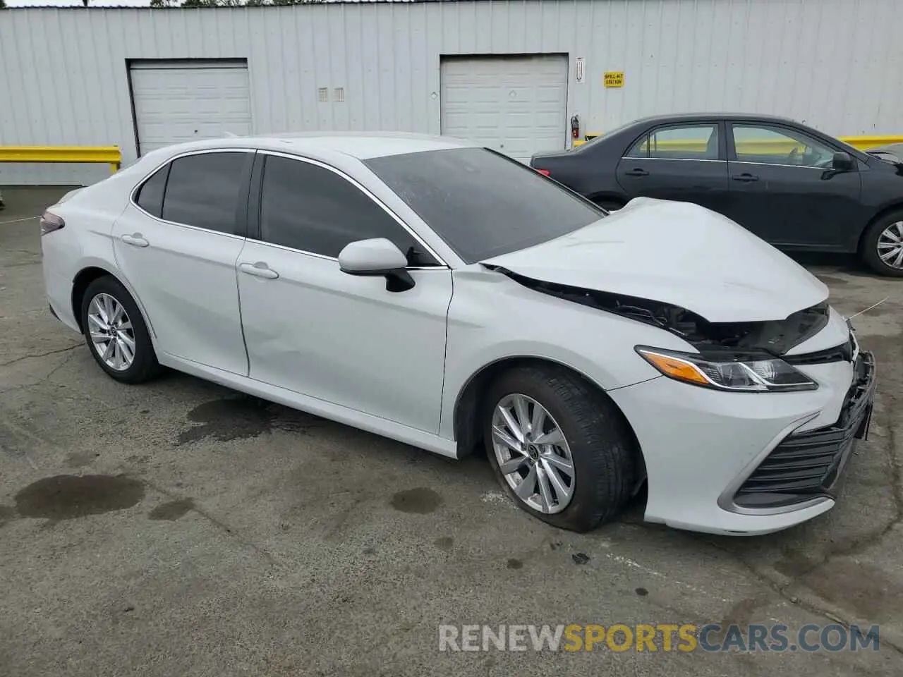 4 Photograph of a damaged car 4T1C11AK2PU105752 TOYOTA CAMRY 2023