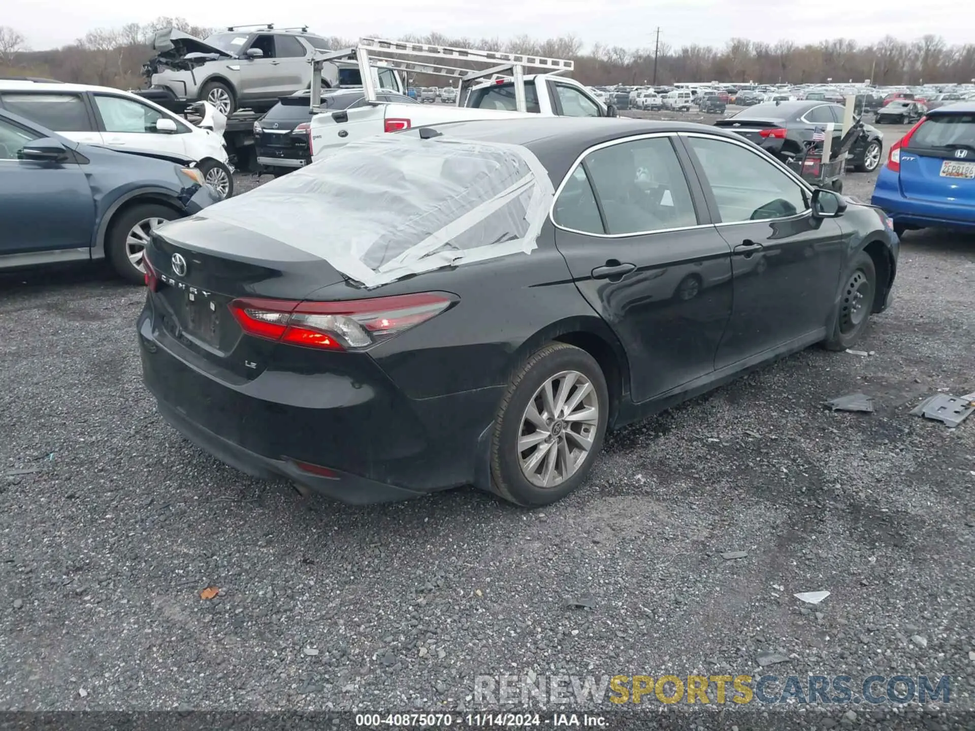 4 Photograph of a damaged car 4T1C11AK2PU108134 TOYOTA CAMRY 2023