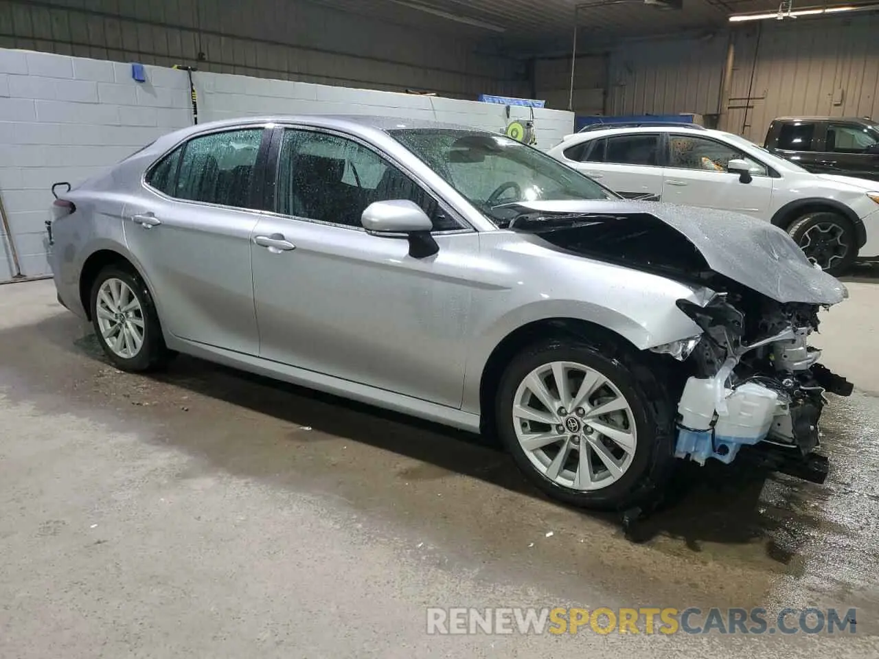 4 Photograph of a damaged car 4T1C11AK2PU722052 TOYOTA CAMRY 2023