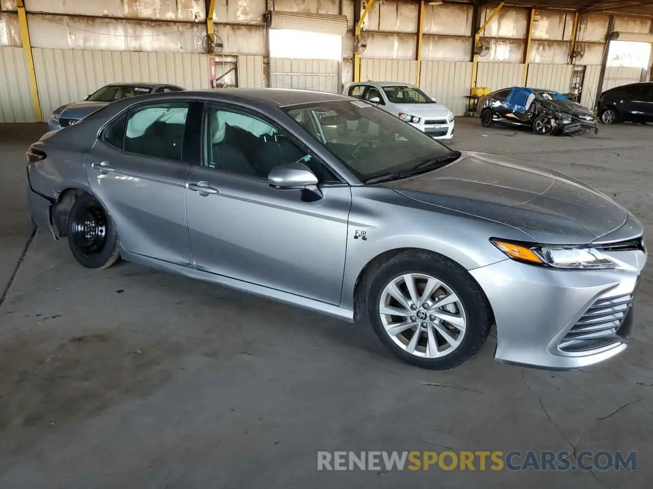 4 Photograph of a damaged car 4T1C11AK2PU727493 TOYOTA CAMRY 2023