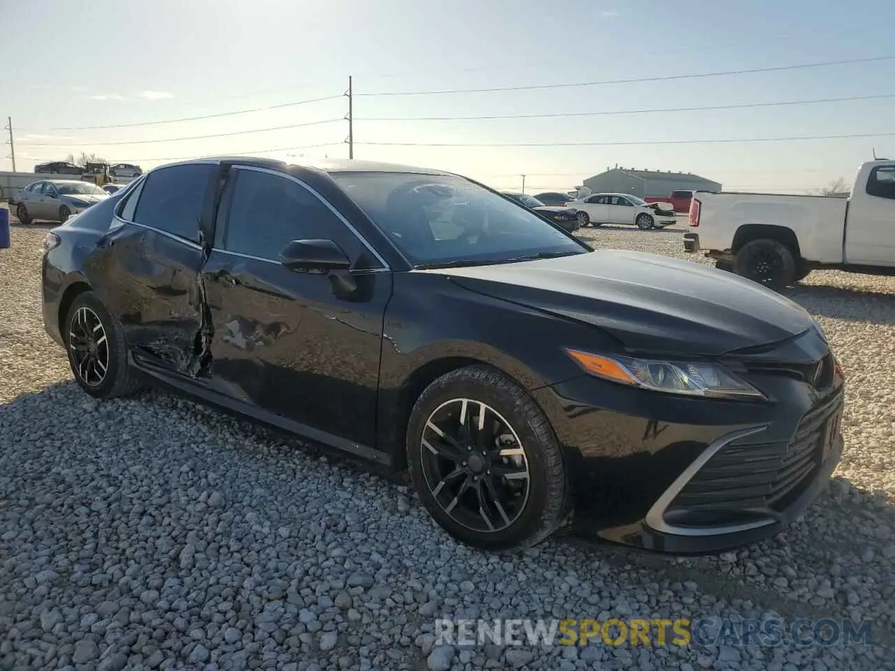4 Photograph of a damaged car 4T1C11AK2PU731804 TOYOTA CAMRY 2023