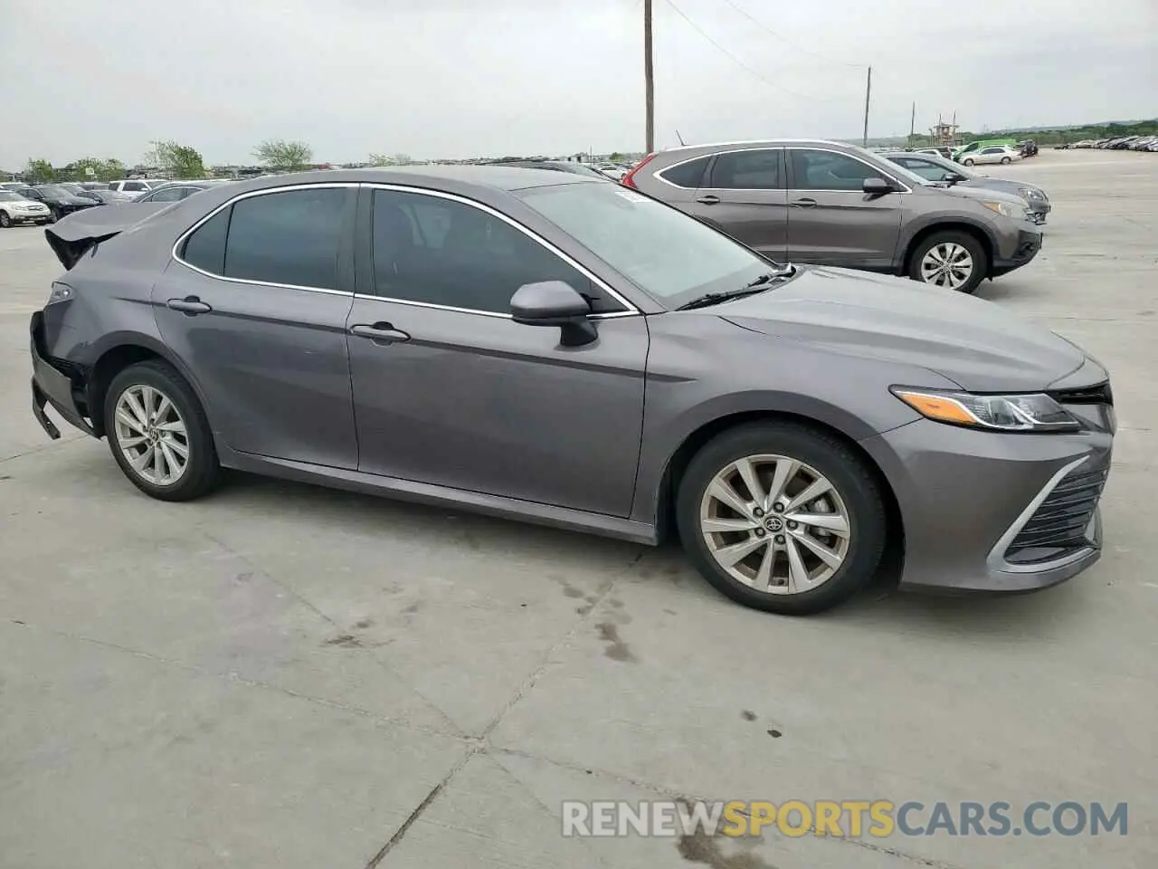 4 Photograph of a damaged car 4T1C11AK2PU735383 TOYOTA CAMRY 2023
