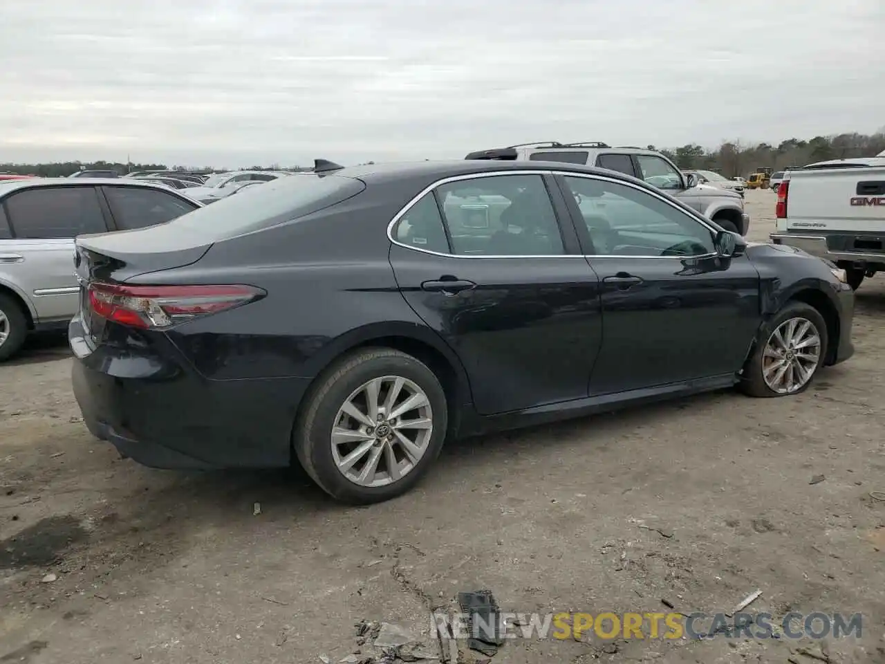 3 Photograph of a damaged car 4T1C11AK6PU735712 TOYOTA CAMRY 2023