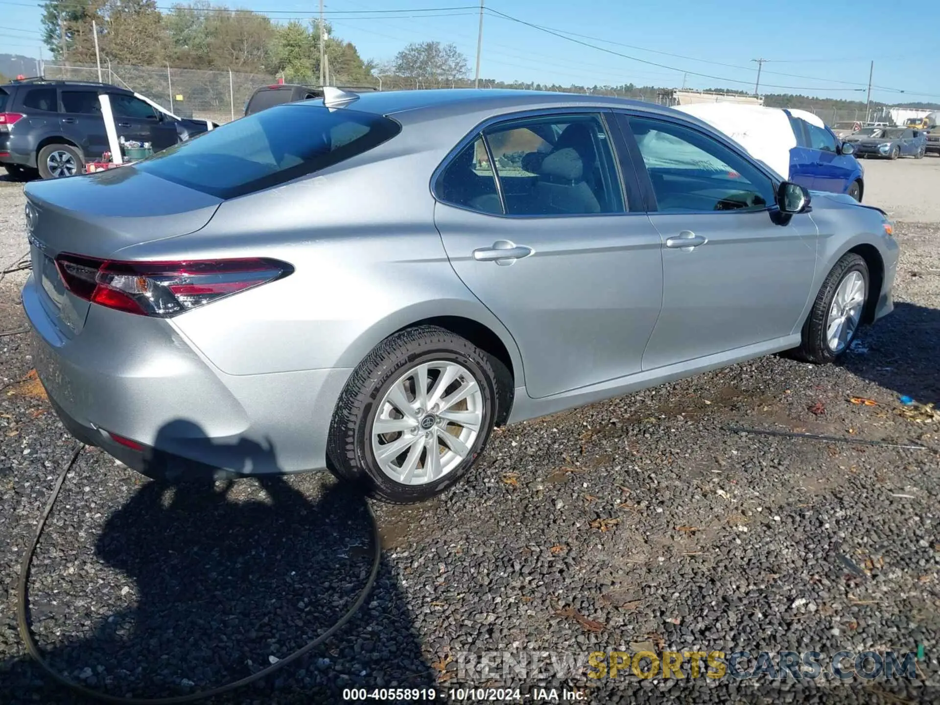 4 Photograph of a damaged car 4T1C11AK7PU135006 TOYOTA CAMRY 2023