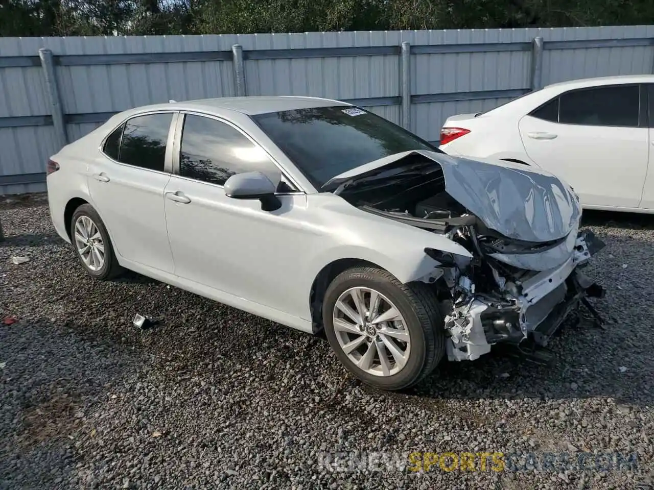 4 Photograph of a damaged car 4T1C11AK7PU142828 TOYOTA CAMRY 2023