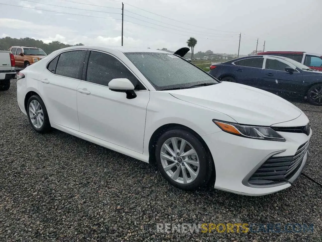4 Photograph of a damaged car 4T1C11AK7PU728333 TOYOTA CAMRY 2023