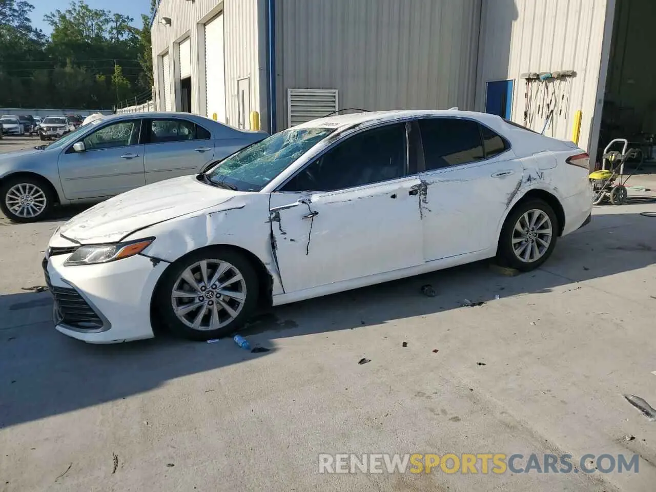 1 Photograph of a damaged car 4T1C11AK8PU077035 TOYOTA CAMRY 2023