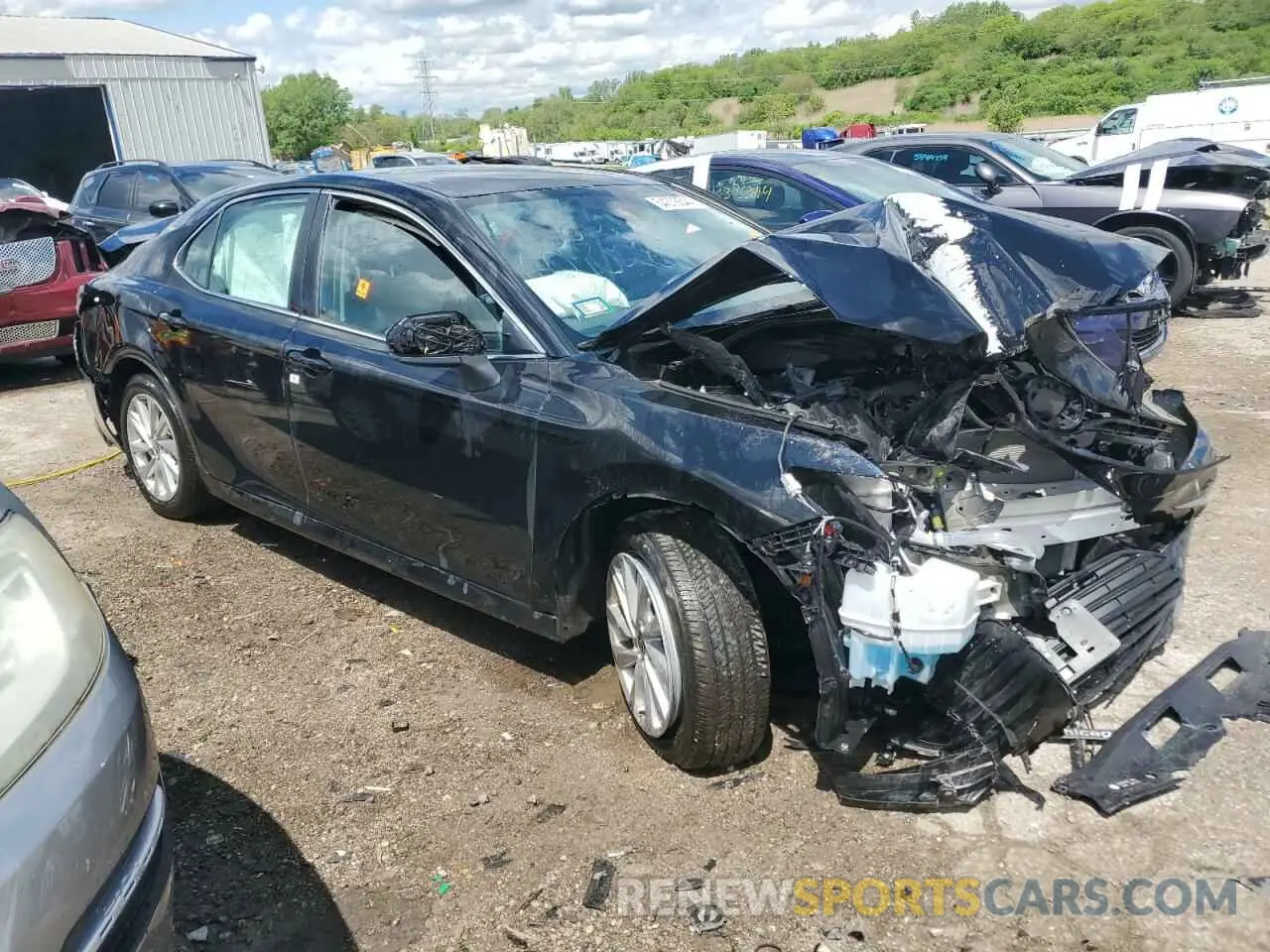 4 Photograph of a damaged car 4T1C11AK8PU128906 TOYOTA CAMRY 2023