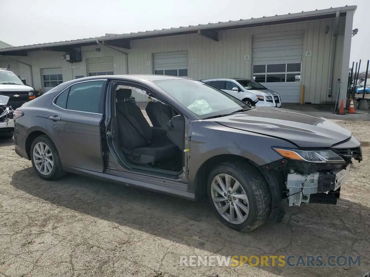 4 Photograph of a damaged car 4T1C11AK8PU727451 TOYOTA CAMRY 2023