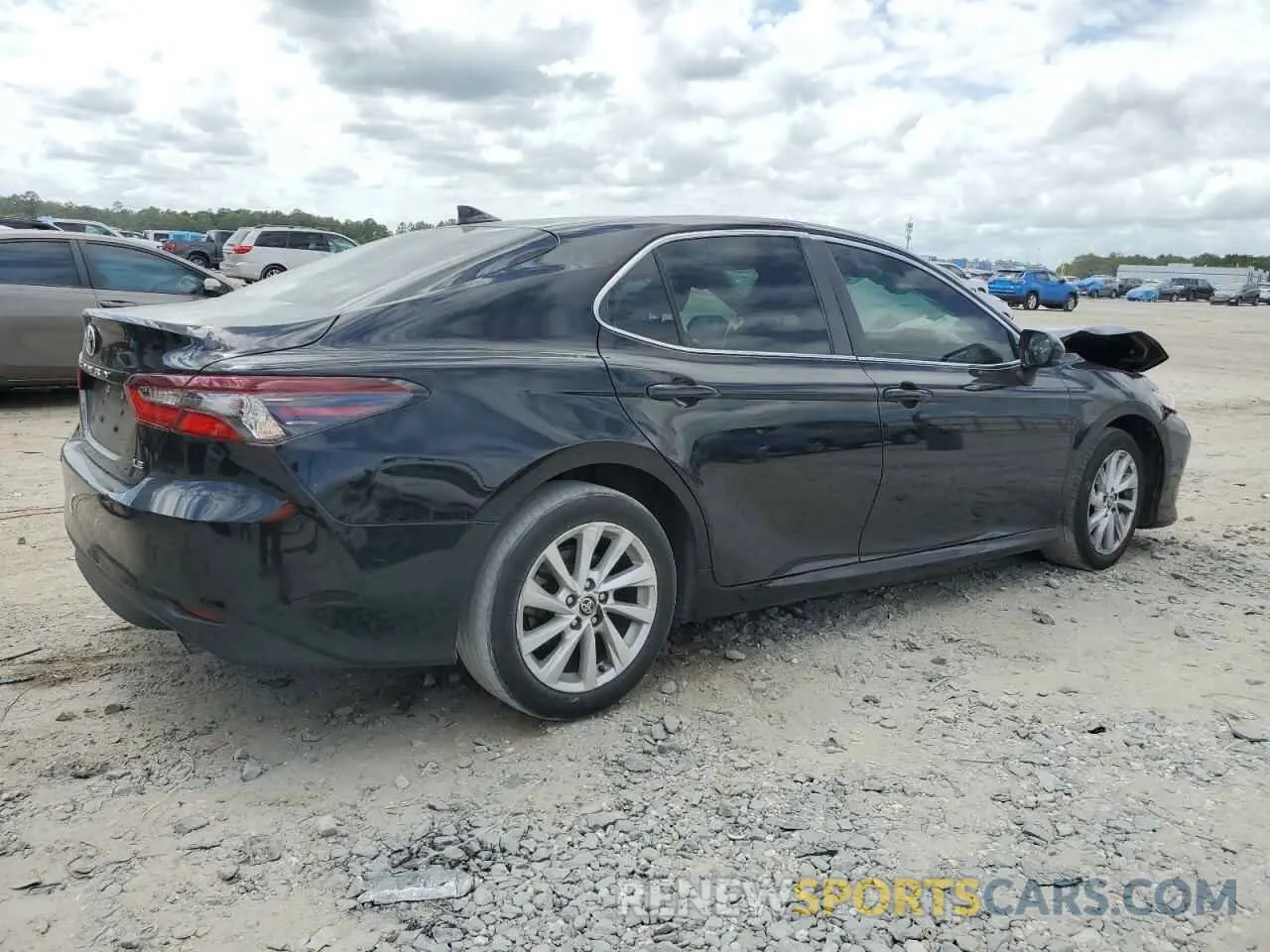 3 Photograph of a damaged car 4T1C11AK8PU765973 TOYOTA CAMRY 2023