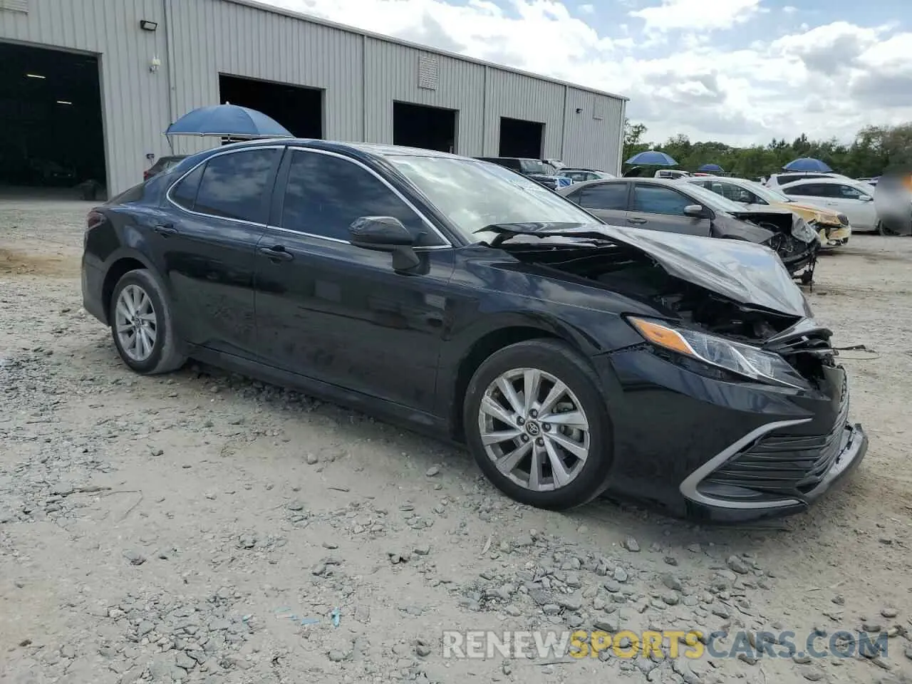 4 Photograph of a damaged car 4T1C11AK8PU765973 TOYOTA CAMRY 2023