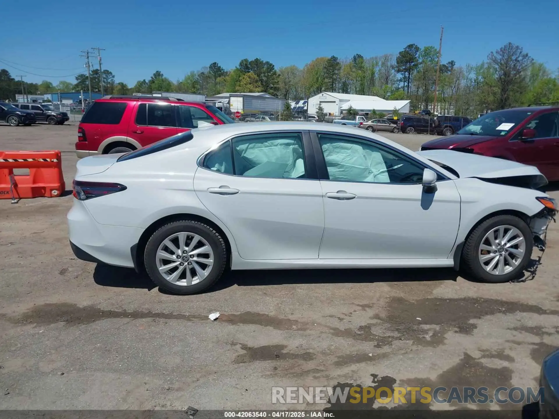 13 Photograph of a damaged car 4T1C11AK9PU142300 TOYOTA CAMRY 2023