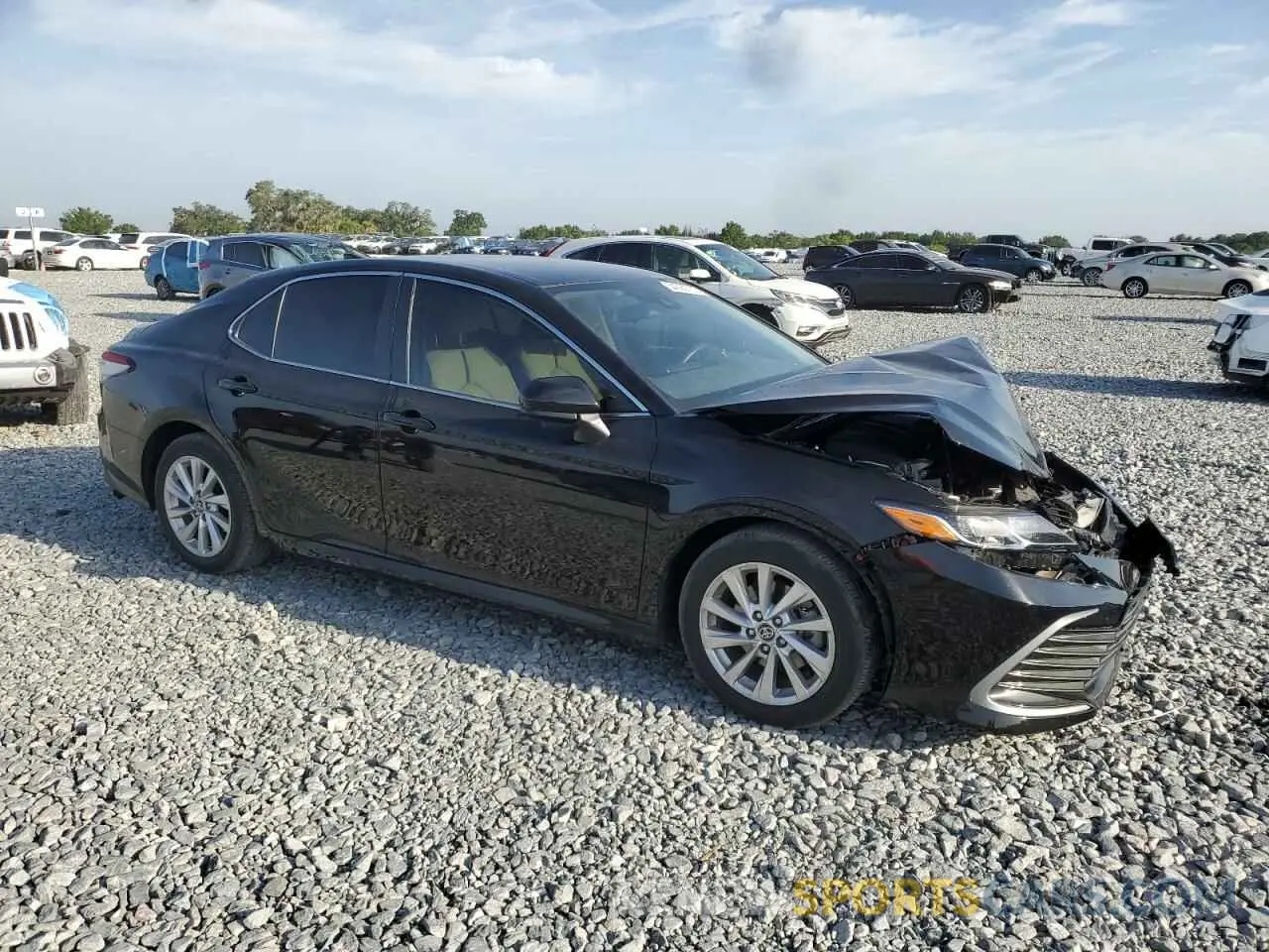 4 Photograph of a damaged car 4T1C11AK9PU800388 TOYOTA CAMRY 2023