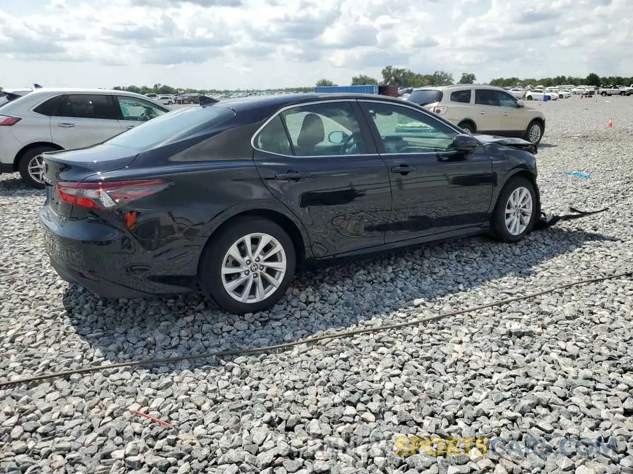 3 Photograph of a damaged car 4T1C11AK9PU830667 TOYOTA CAMRY 2023