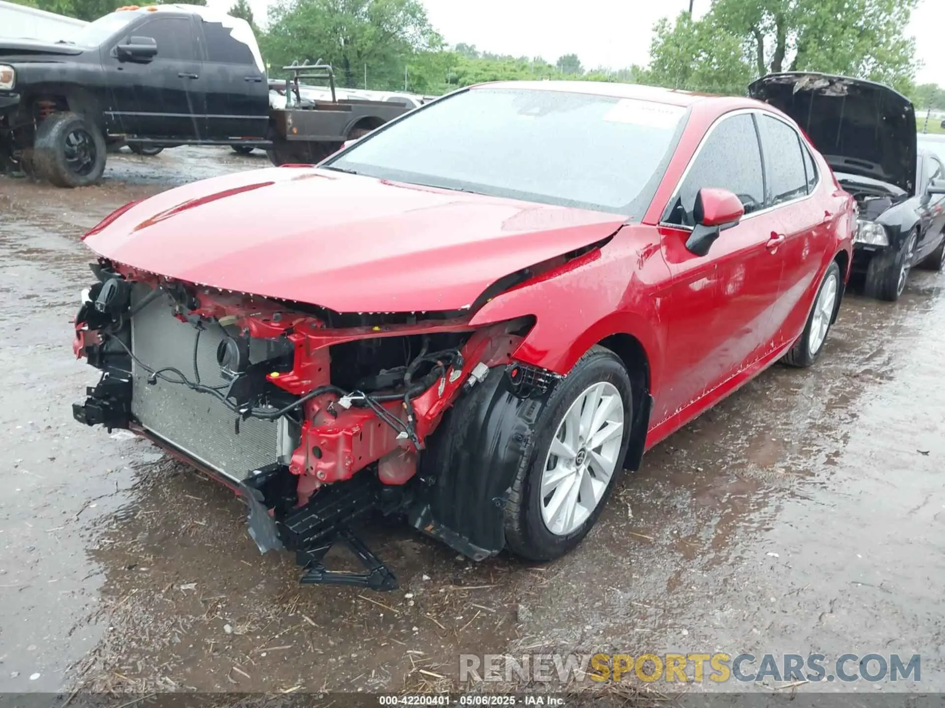 2 Photograph of a damaged car 4T1C11AKXPU079627 TOYOTA CAMRY 2023