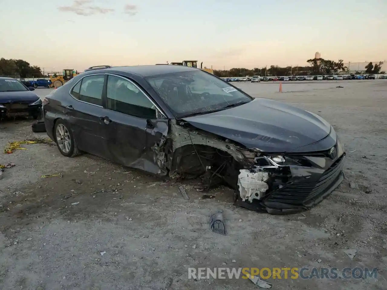 4 Photograph of a damaged car 4T1C11AKXPU106132 TOYOTA CAMRY 2023