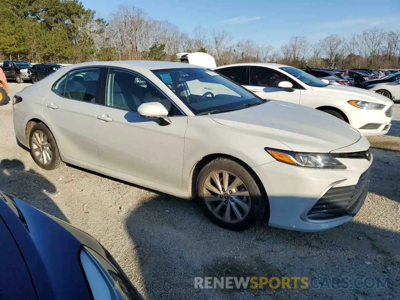 4 Photograph of a damaged car 4T1C11AKXPU129149 TOYOTA CAMRY 2023