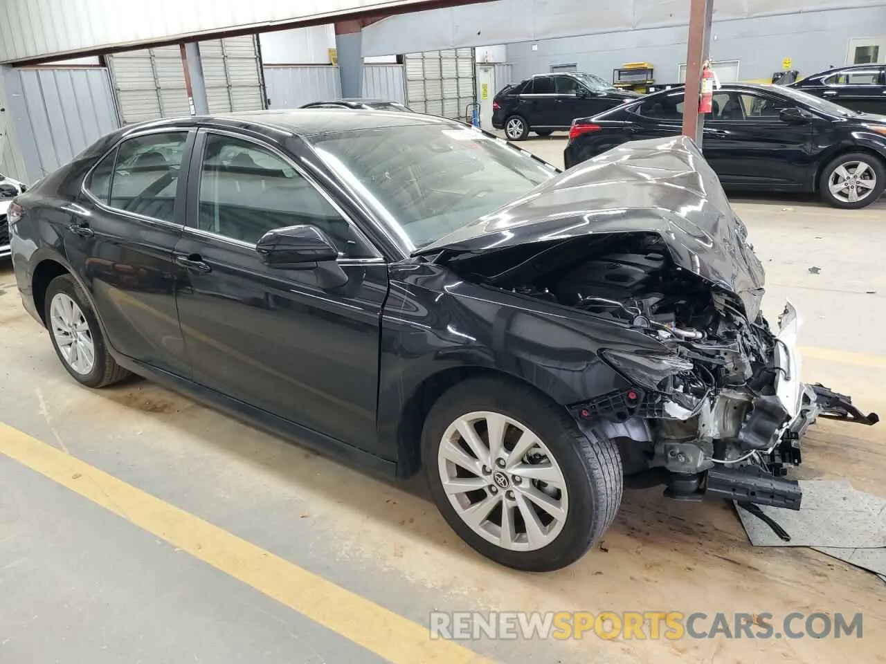 4 Photograph of a damaged car 4T1C11AKXPU173085 TOYOTA CAMRY 2023