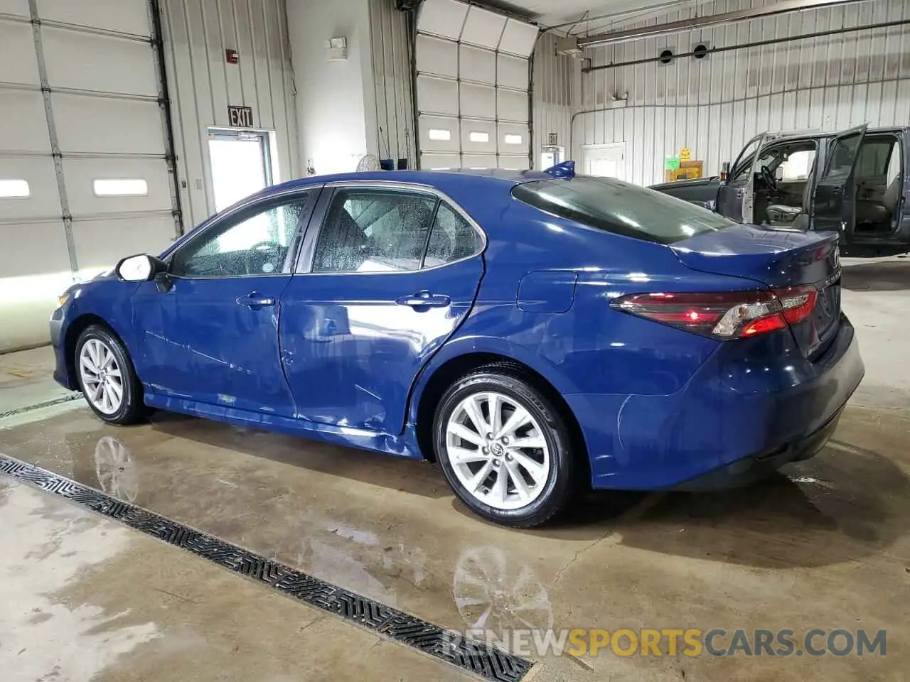 2 Photograph of a damaged car 4T1C11AKXPU175709 TOYOTA CAMRY 2023