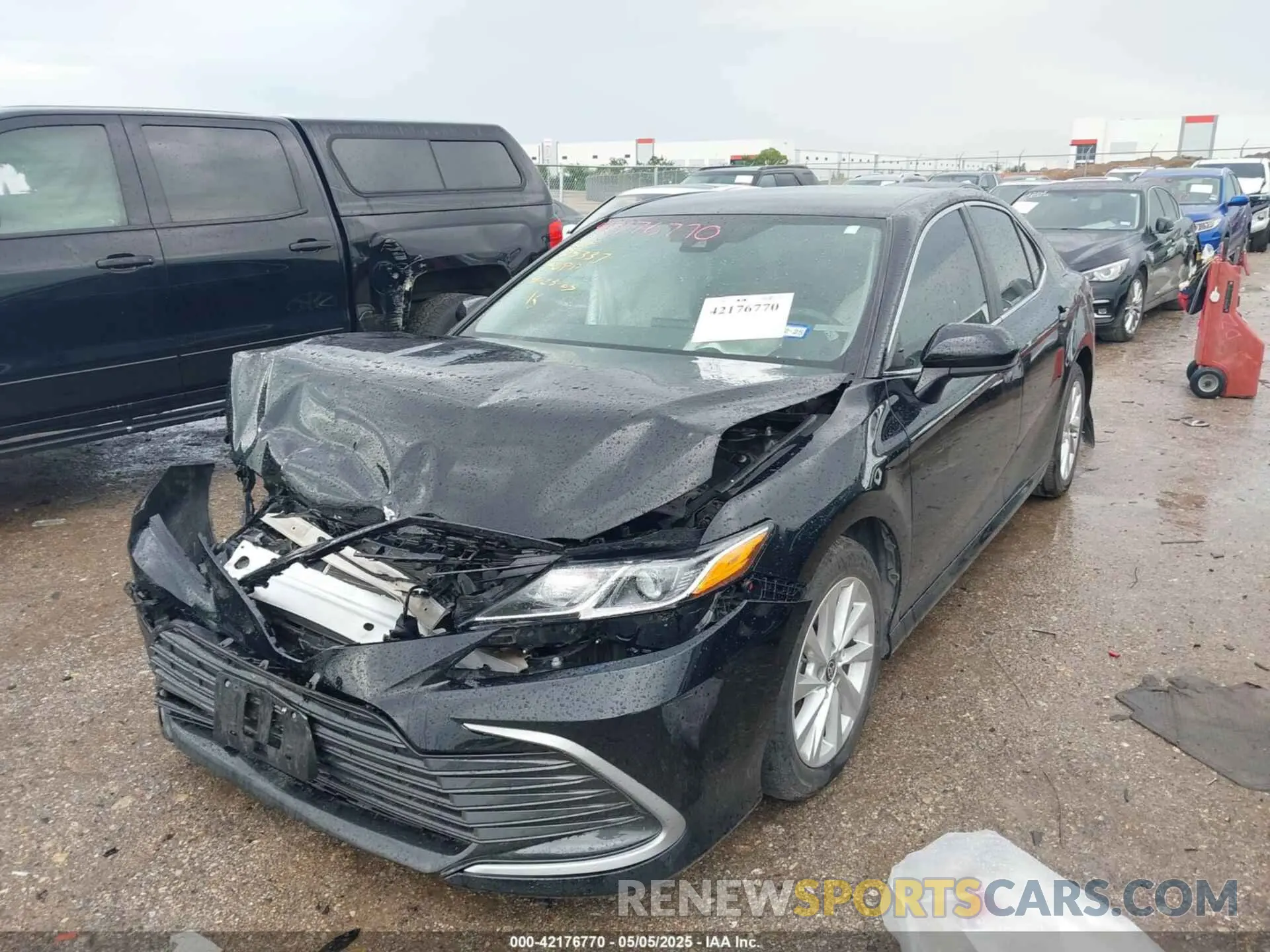 2 Photograph of a damaged car 4T1C11AKXPU766851 TOYOTA CAMRY 2023