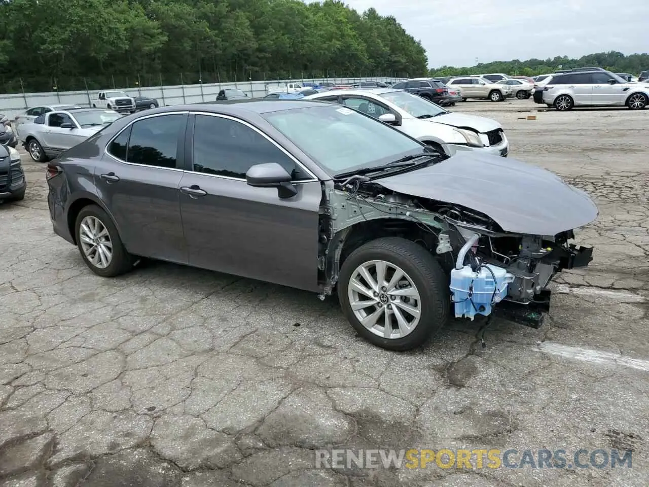4 Photograph of a damaged car 4T1C11AKXPU802375 TOYOTA CAMRY 2023