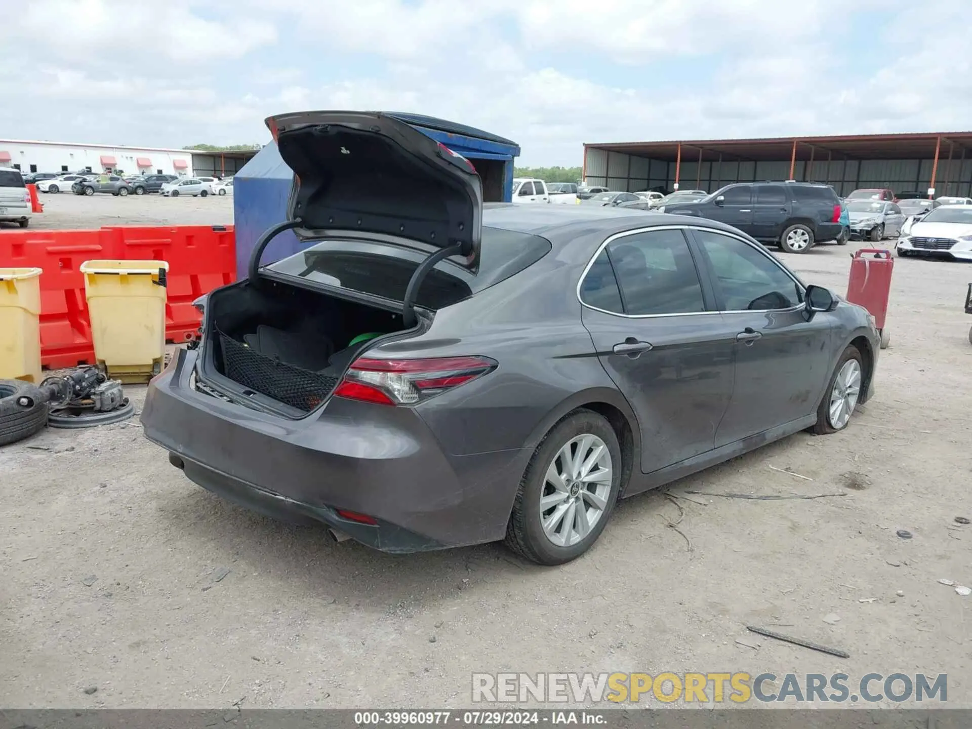 4 Photograph of a damaged car 4T1C11AKXPU809018 TOYOTA CAMRY 2023