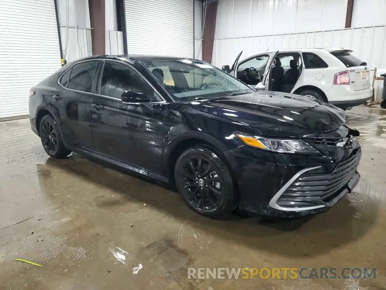 4 Photograph of a damaged car 4T1C11BK0PU106607 TOYOTA CAMRY 2023