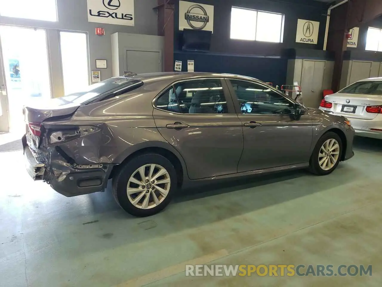 3 Photograph of a damaged car 4T1C11BK1PU080745 TOYOTA CAMRY 2023