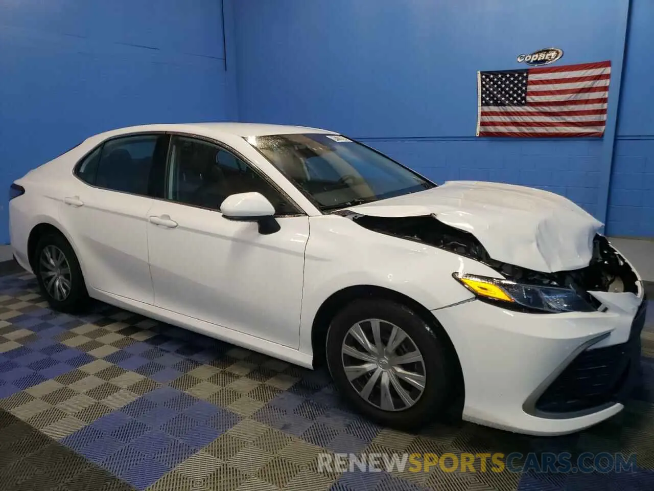 4 Photograph of a damaged car 4T1C31AKXPU614952 TOYOTA CAMRY 2023