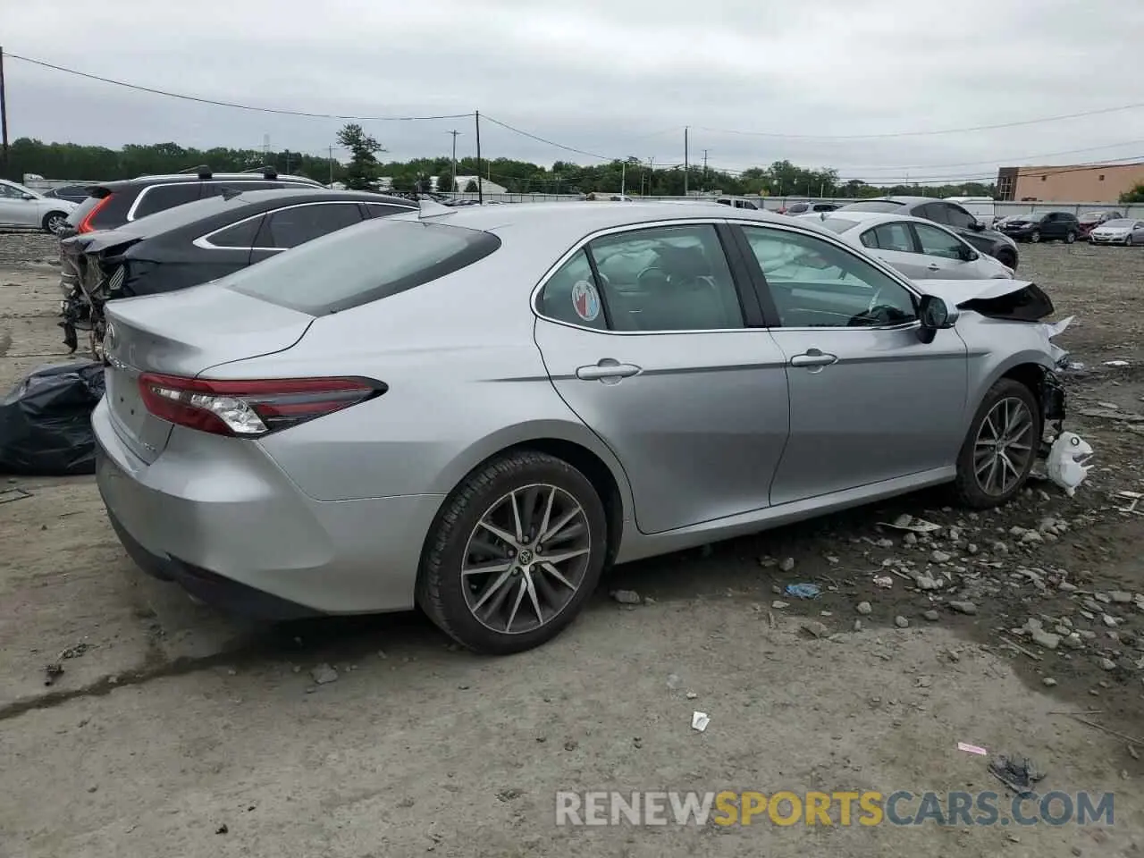 3 Photograph of a damaged car 4T1F11AK0PU758285 TOYOTA CAMRY 2023