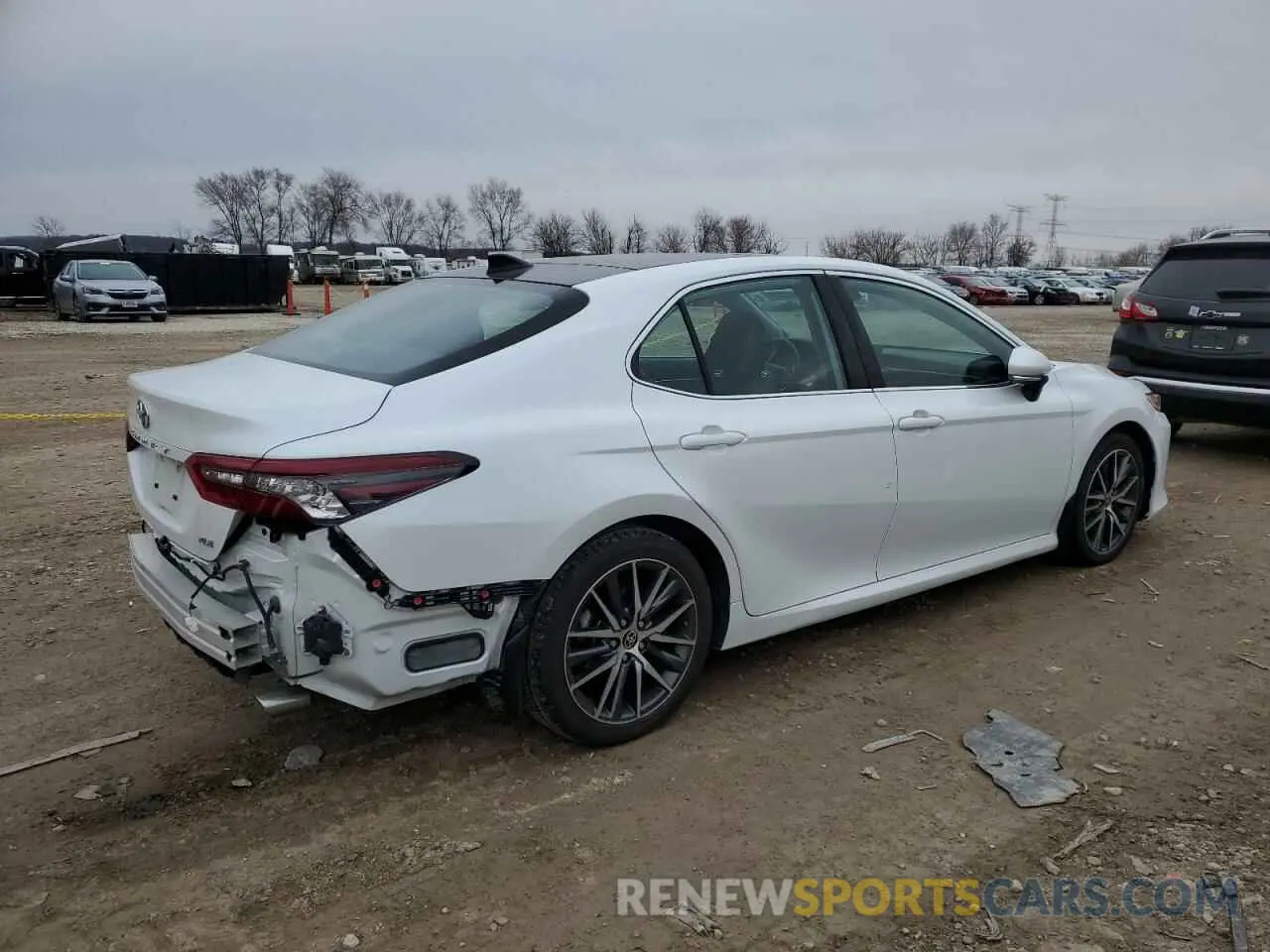 3 Photograph of a damaged car 4T1F11AKXPU743843 TOYOTA CAMRY 2023