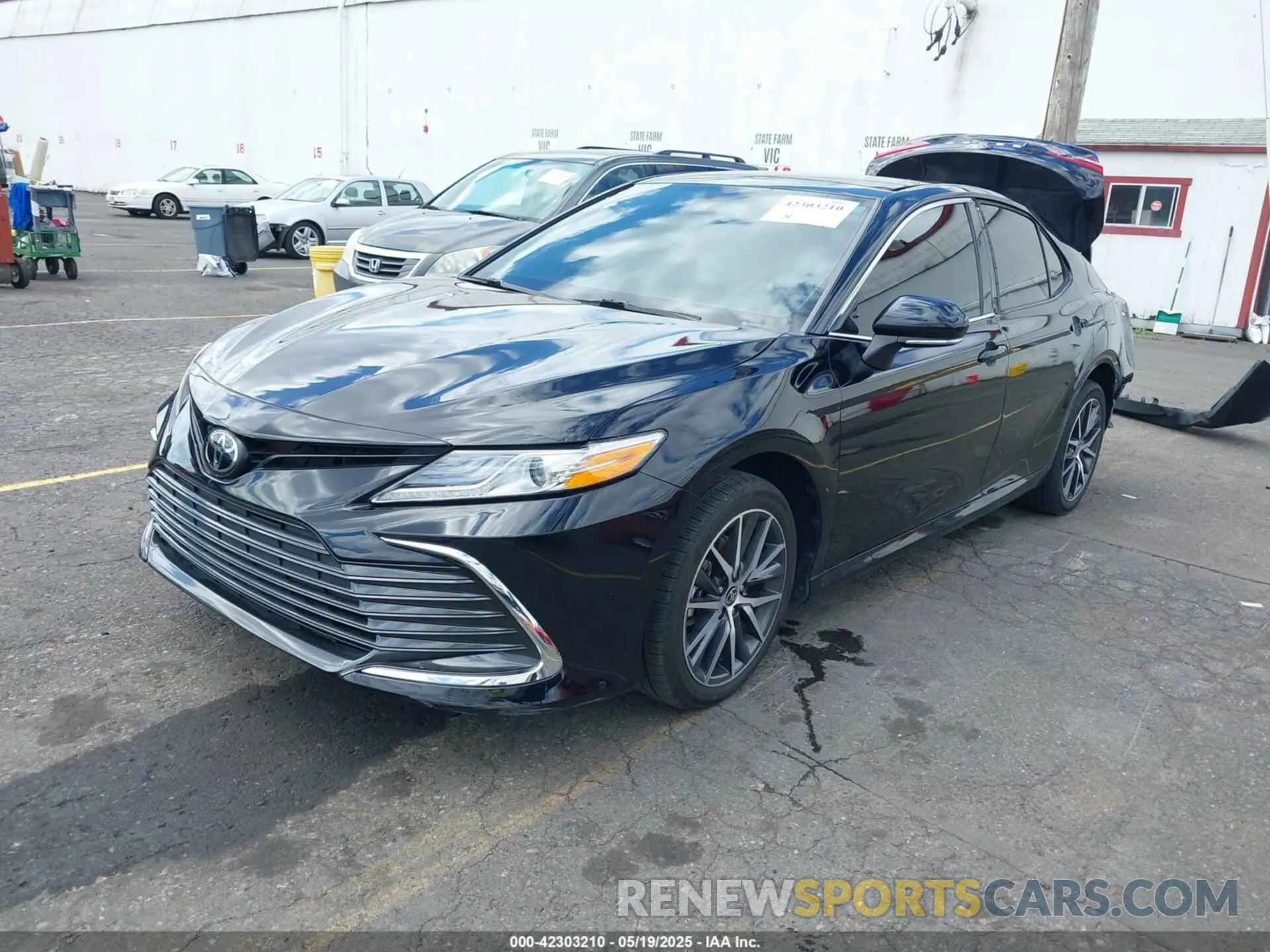 2 Photograph of a damaged car 4T1F11BK1PU094951 TOYOTA CAMRY 2023