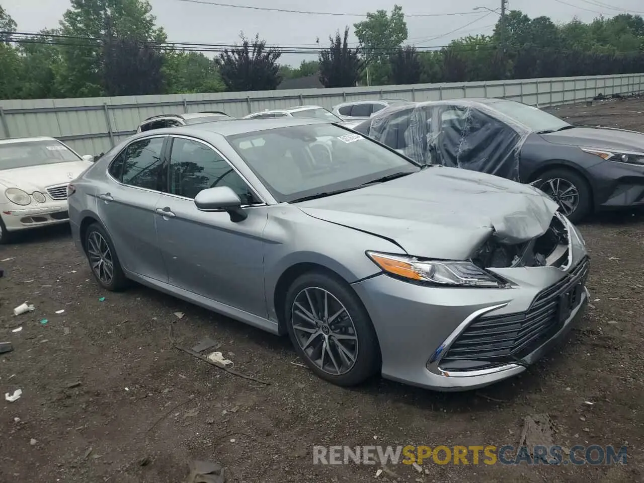 4 Photograph of a damaged car 4T1F11BKXPU076979 TOYOTA CAMRY 2023