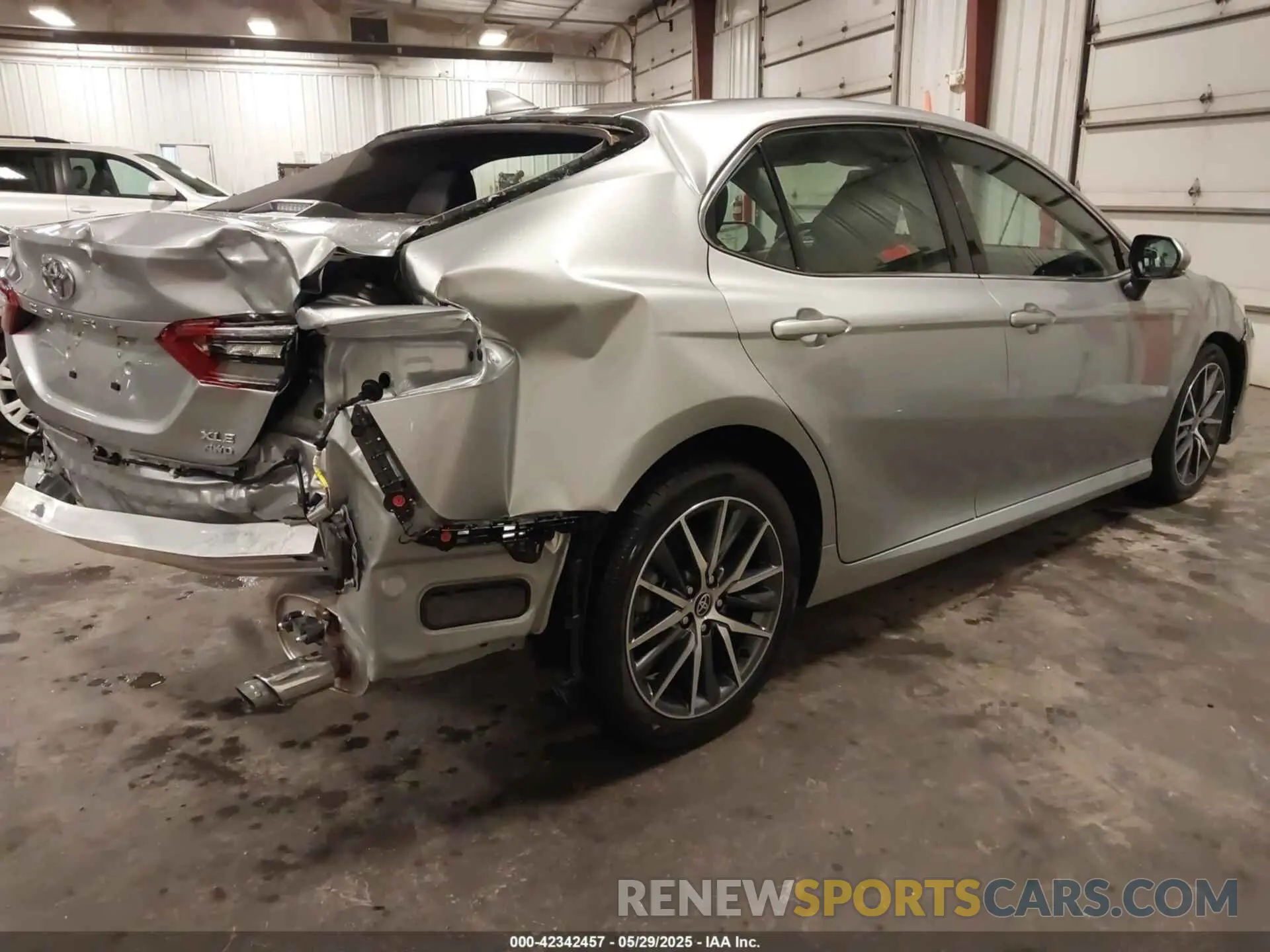4 Photograph of a damaged car 4T1F11BKXPU087724 TOYOTA CAMRY 2023
