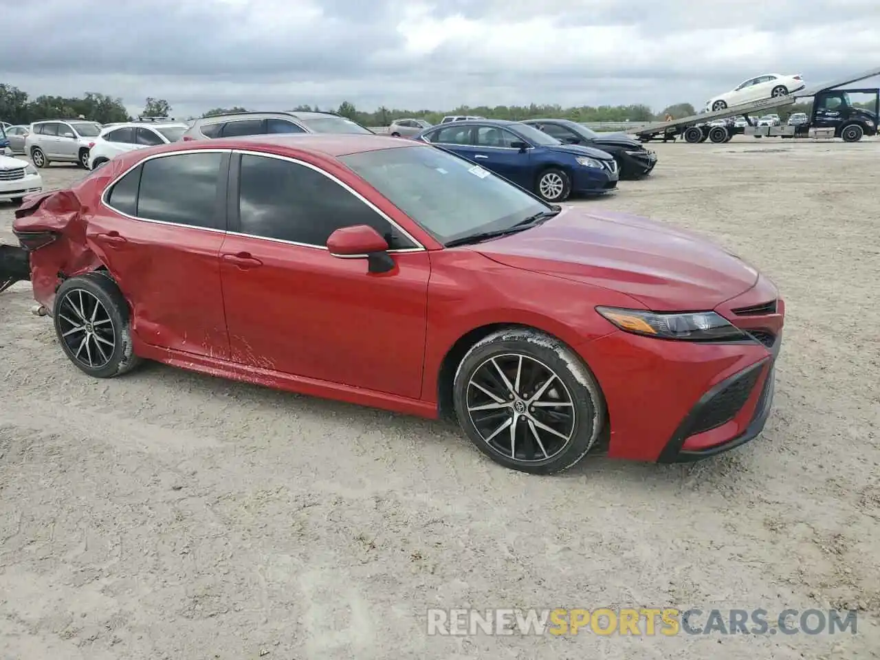 4 Photograph of a damaged car 4T1G11AK0PU133938 TOYOTA CAMRY 2023