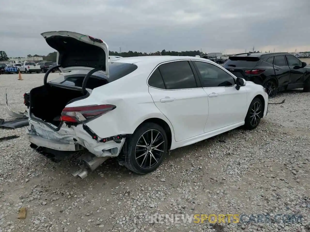 3 Photograph of a damaged car 4T1G11AK0PU188034 TOYOTA CAMRY 2023