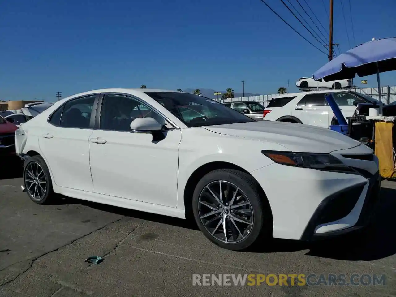 4 Photograph of a damaged car 4T1G11AK1PU180556 TOYOTA CAMRY 2023