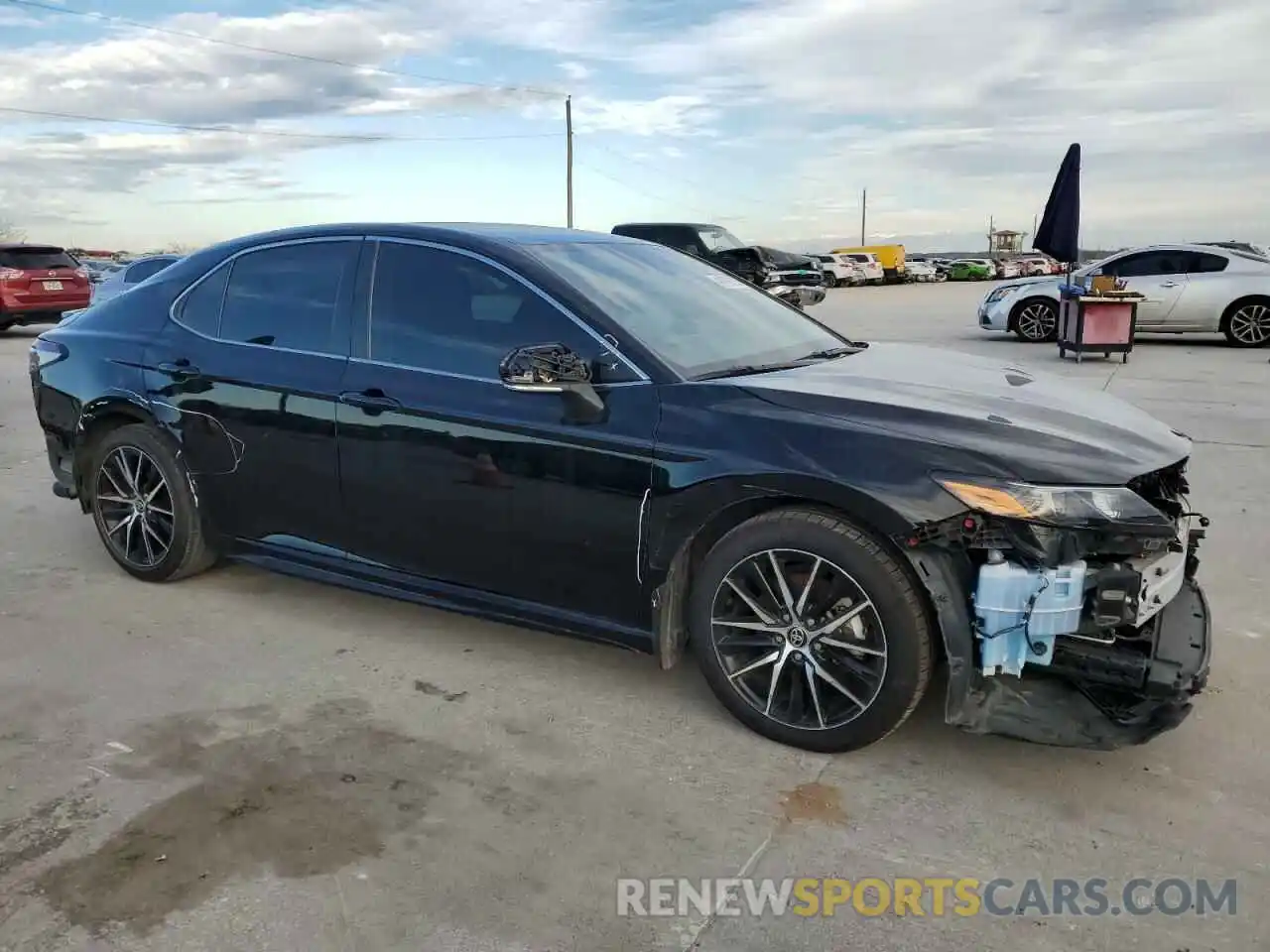 4 Photograph of a damaged car 4T1G11AK1PU781076 TOYOTA CAMRY 2023