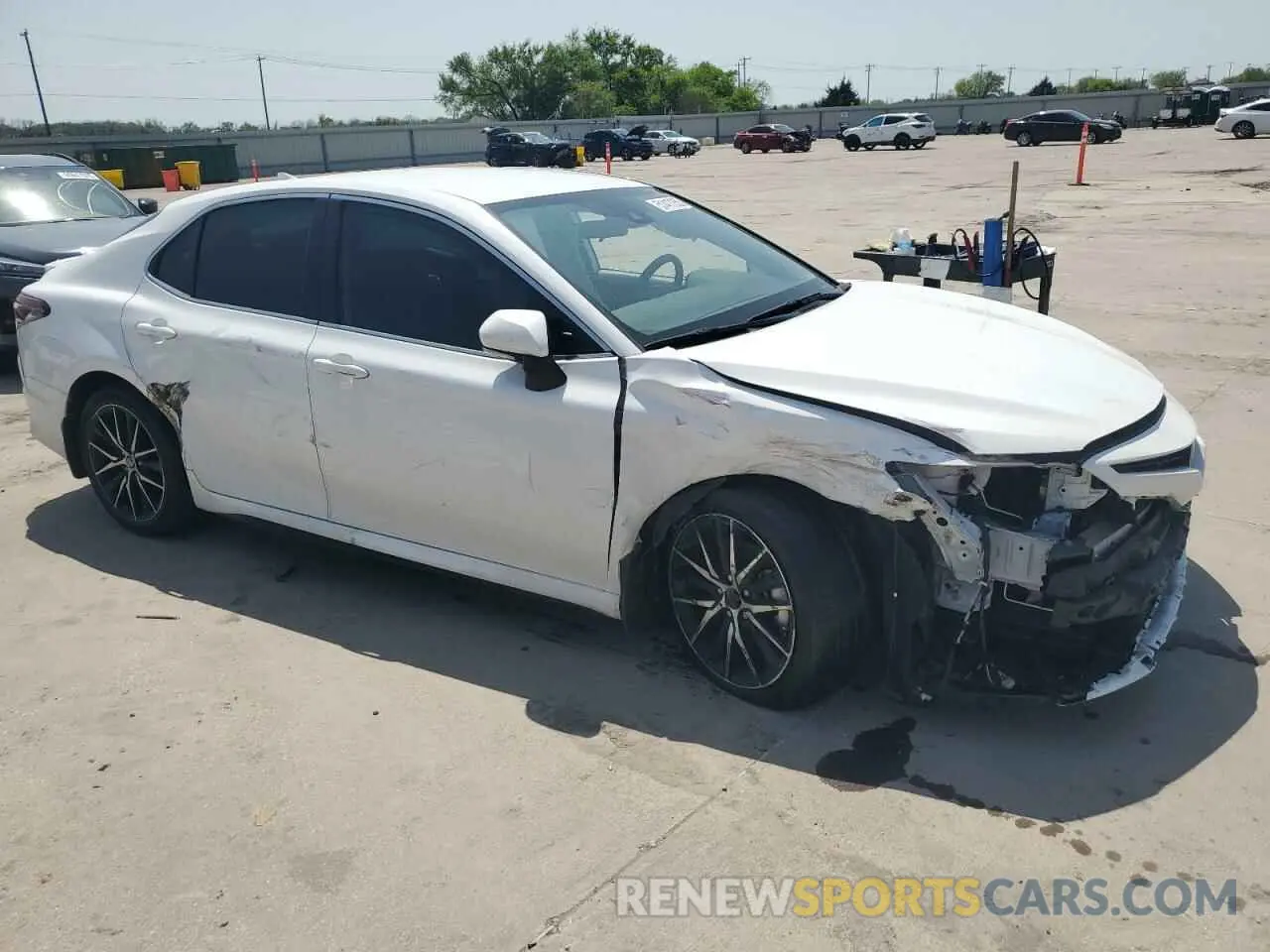 4 Photograph of a damaged car 4T1G11AK2PU765629 TOYOTA CAMRY 2023