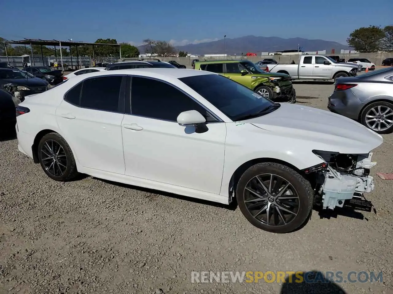 4 Photograph of a damaged car 4T1G11AK2PU809905 TOYOTA CAMRY 2023