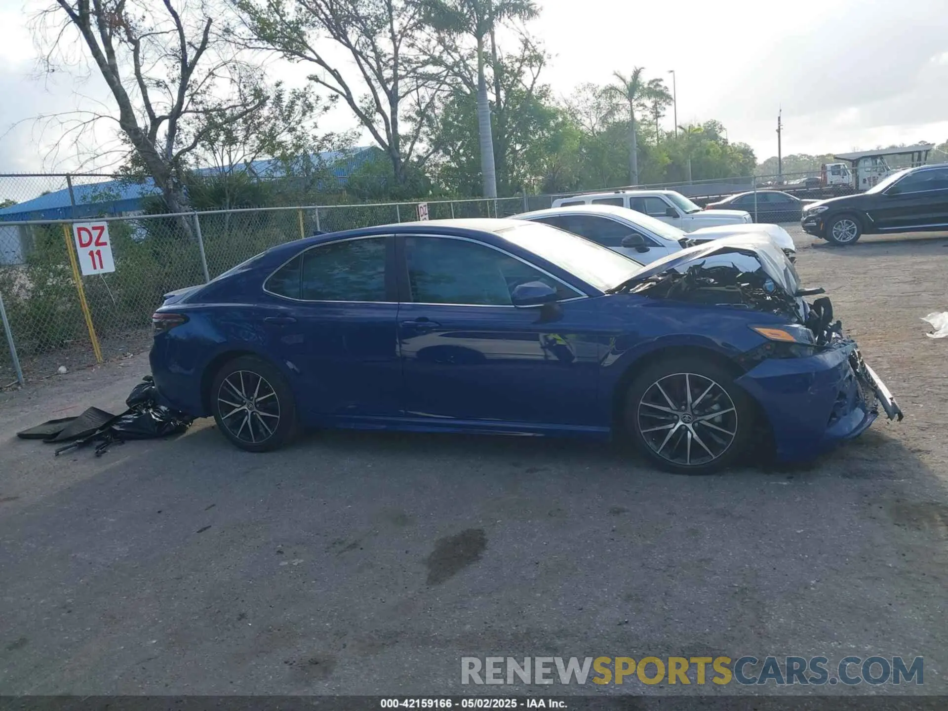 13 Photograph of a damaged car 4T1G11AK3PU099381 TOYOTA CAMRY 2023