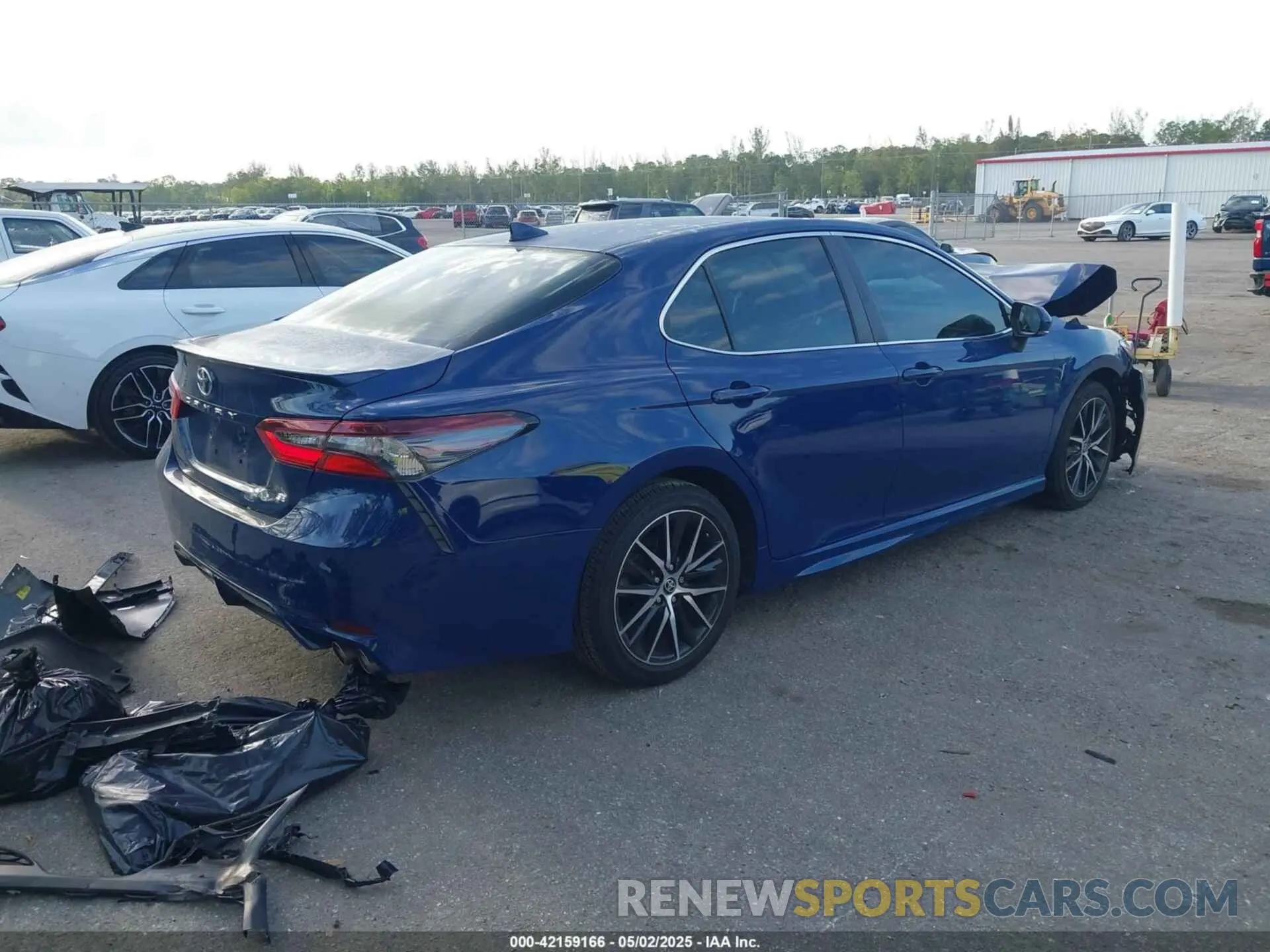 4 Photograph of a damaged car 4T1G11AK3PU099381 TOYOTA CAMRY 2023