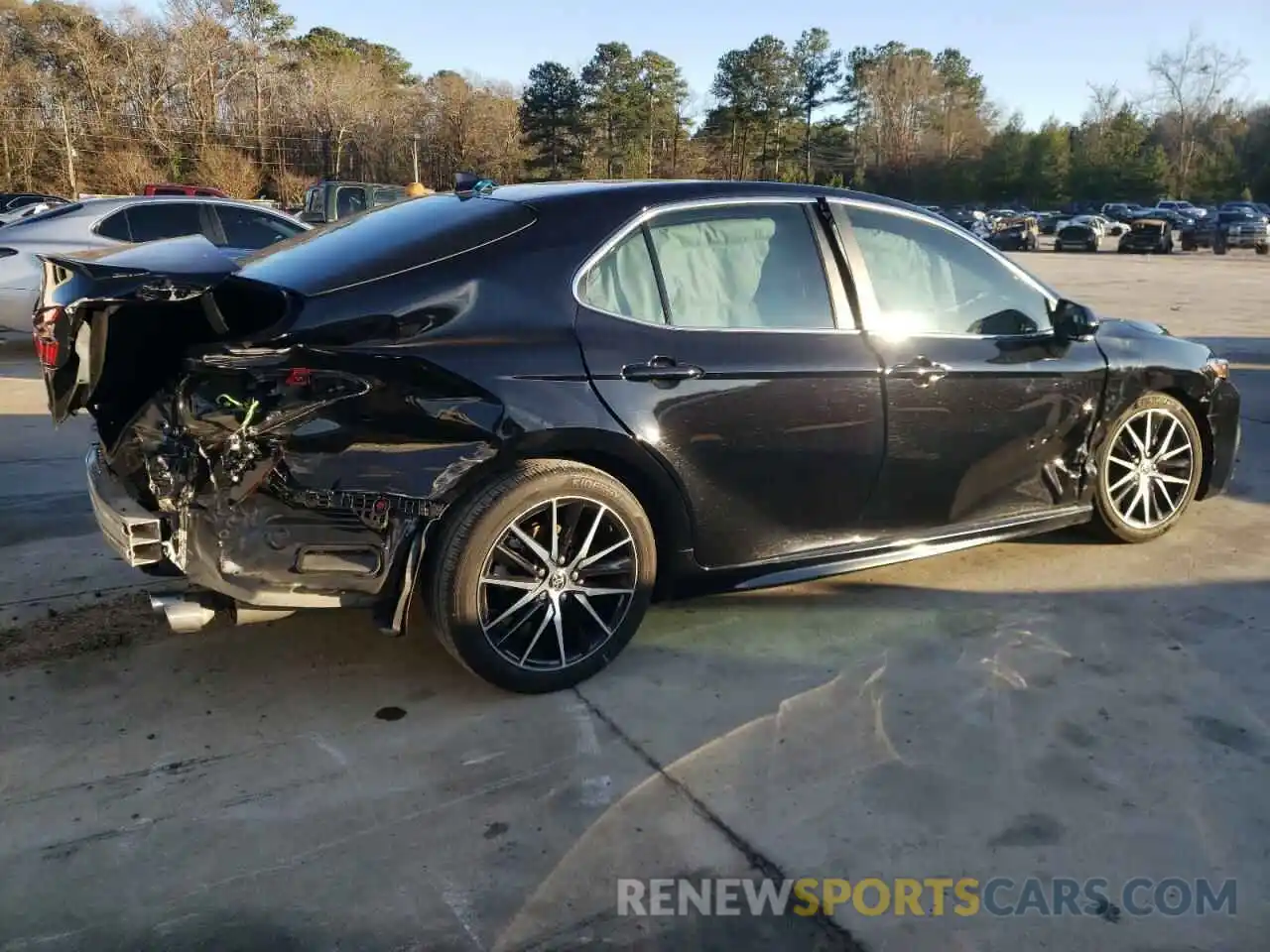 3 Photograph of a damaged car 4T1G11AK3PU759953 TOYOTA CAMRY 2023