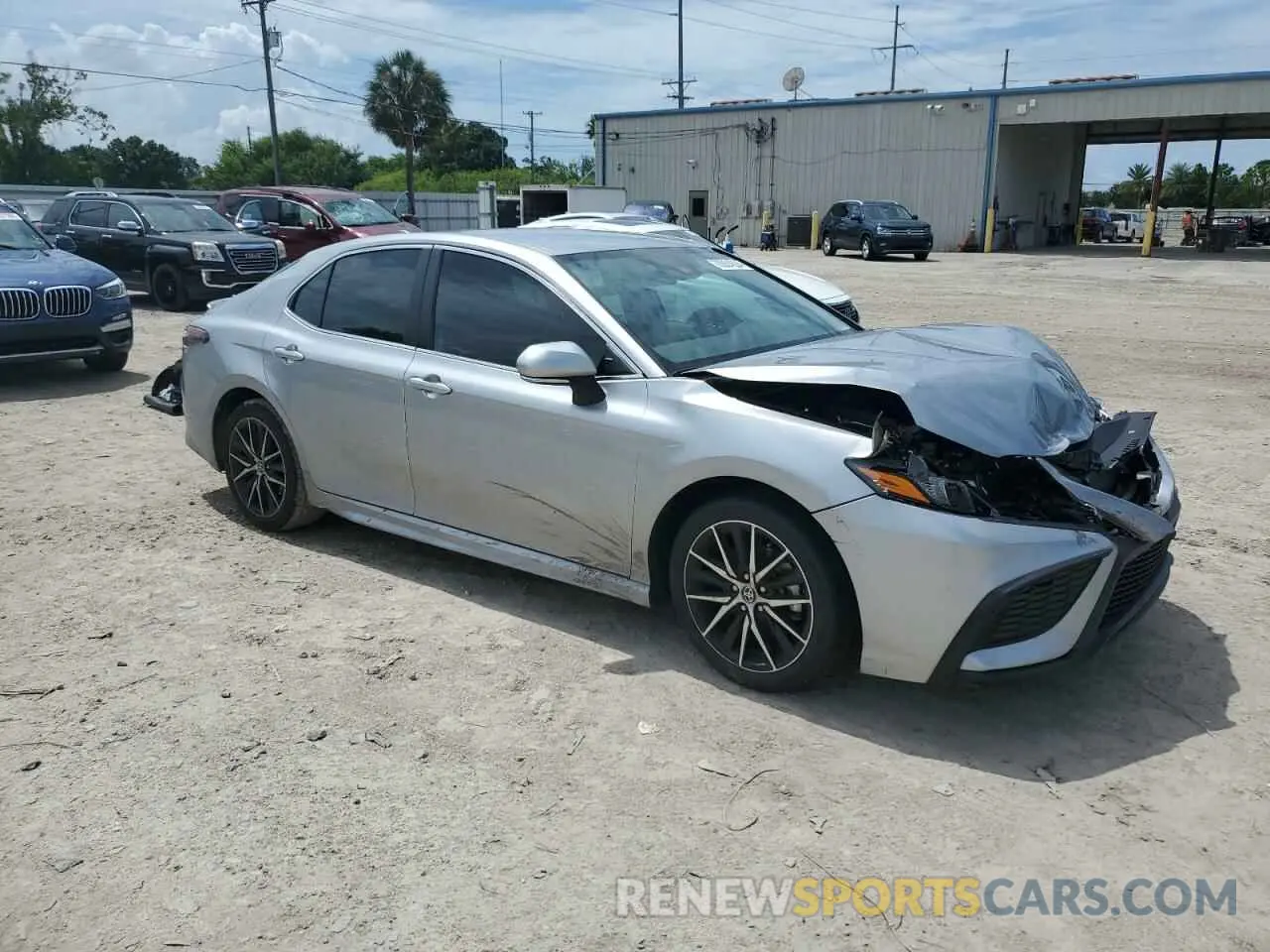 4 Photograph of a damaged car 4T1G11AK3PU779264 TOYOTA CAMRY 2023