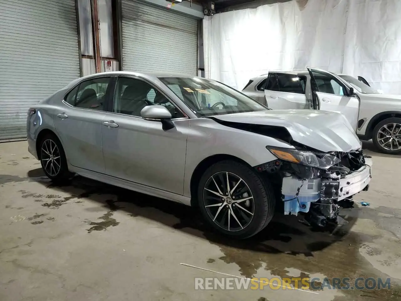 4 Photograph of a damaged car 4T1G11AK4PU164139 TOYOTA CAMRY 2023