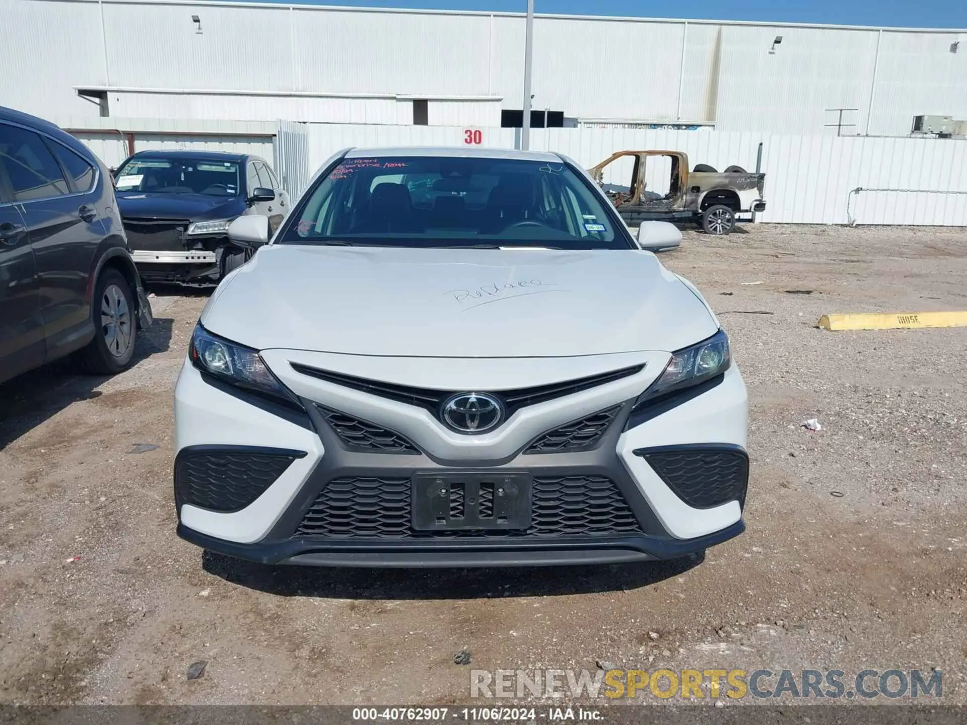 12 Photograph of a damaged car 4T1G11AK4PU186528 TOYOTA CAMRY 2023