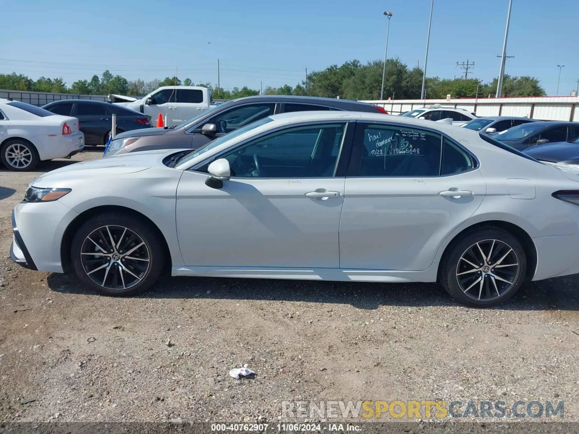 14 Photograph of a damaged car 4T1G11AK4PU186528 TOYOTA CAMRY 2023